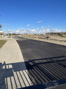 a newly paved tarmac overlooking the track